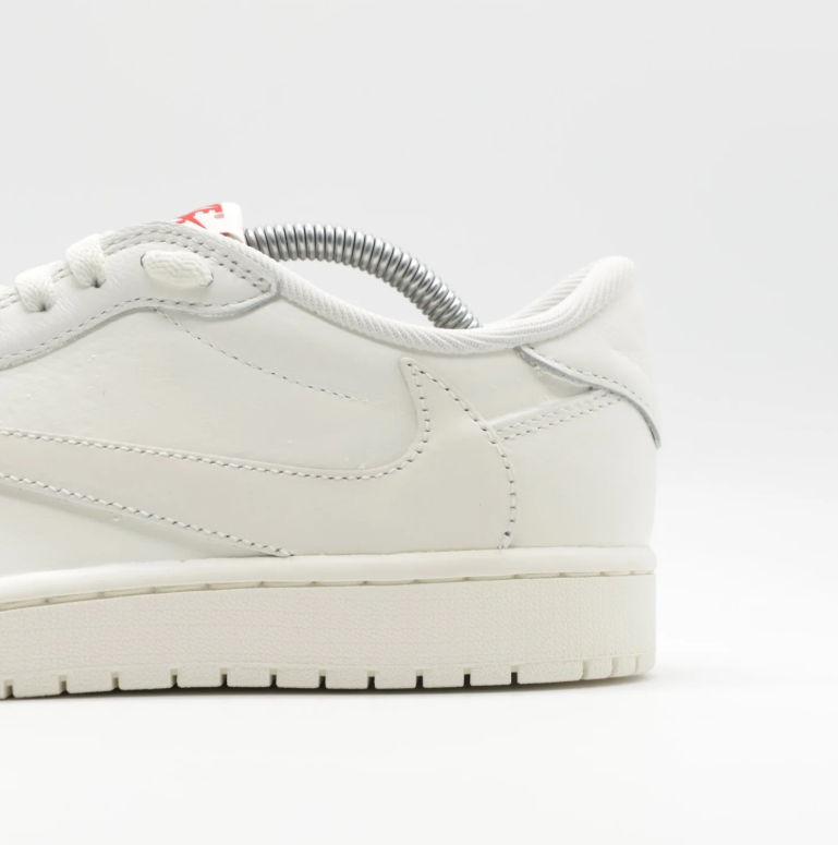 Reverse-Swoosh Low-Top Sneakers – White & Cream with Red Accents