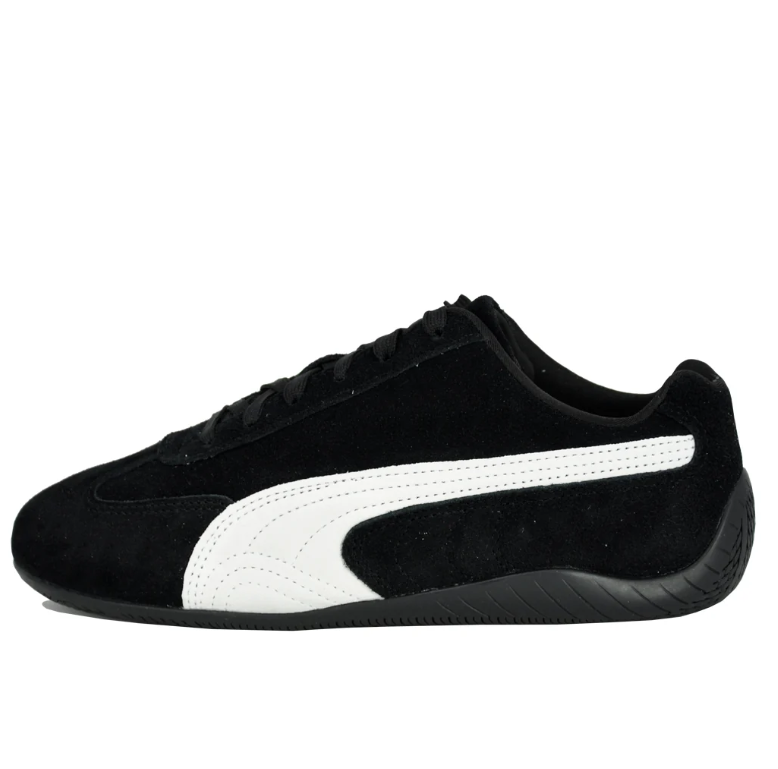 PUMA Low-Profile Sneakers – Black & White with Gold Accents